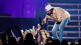 VIDEO: Thomas Rhett jumps off stage to help fan who collapsed during his show